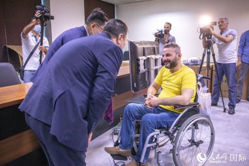 叙利亚残障人士获赠中国电动轮椅