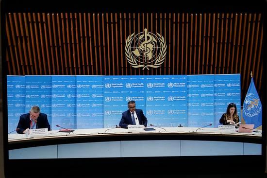 Photo taken in Brussels of Belgium on June 29, 2020 shows World Health Organization (WHO) Director-General Tedros Adhanom Ghebreyesus (C) attending an online press conference held in Geneva, Switzerland. (Xinhua/Zhang Cheng)